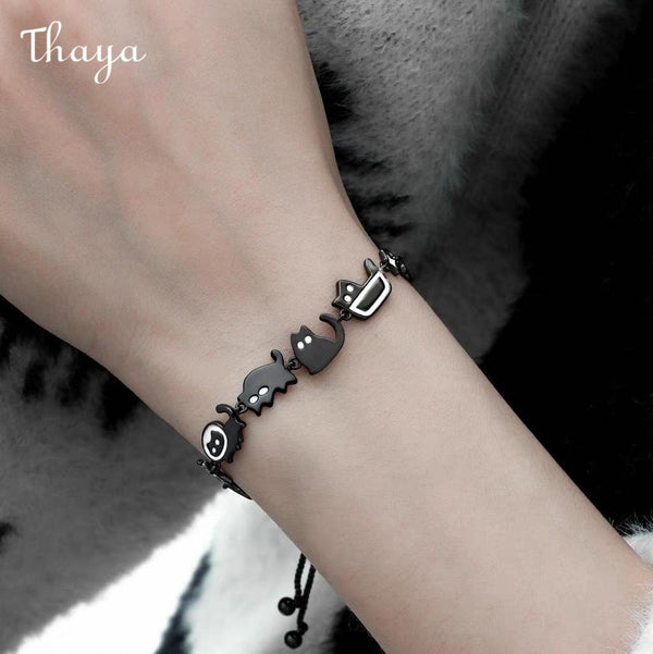 Bracelet noir mignon de dessin animé Thaya