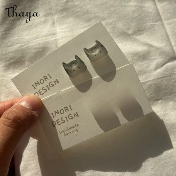Thaya  Cute Playful Cat Face Stud Earrings