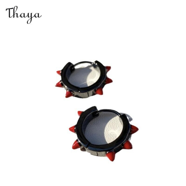 Thaya  Studded Punk Rock Earrings