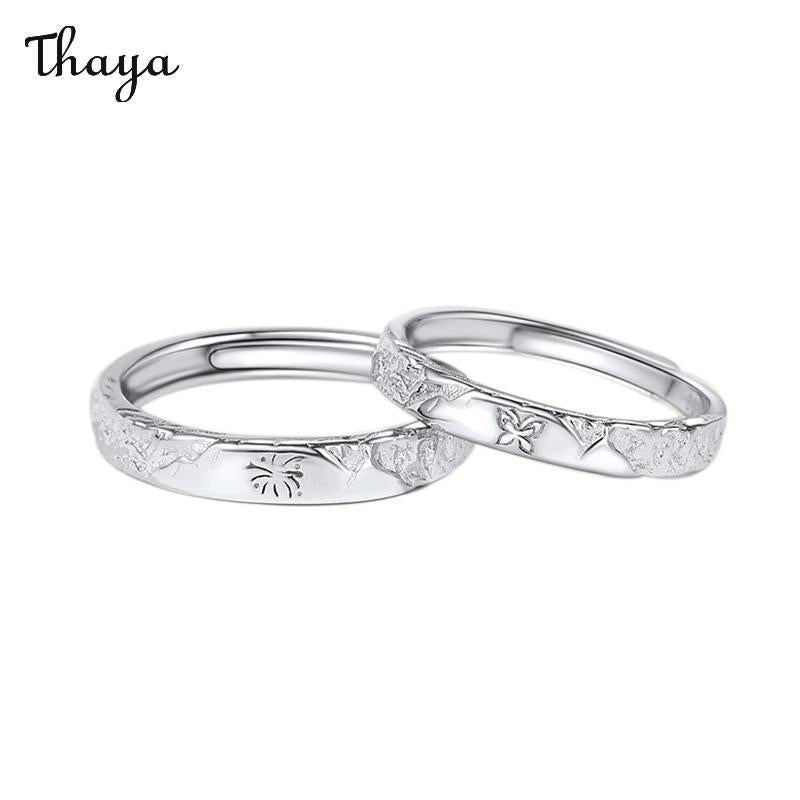 Bagues de couple Thaya en argent 999 avec feux d'artifice et papillon
