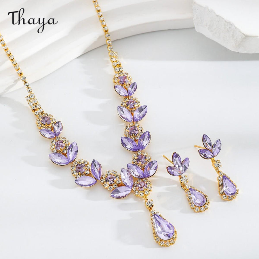 Thaya Leafy Pendant Necklace Earring Set