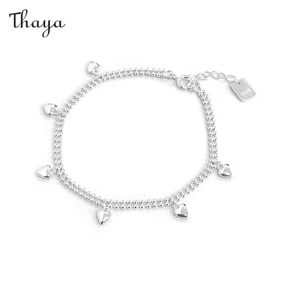 Bracelet Thaya en argent 925 avec breloque et symbole d'amour