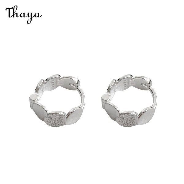 Thaya Frosted Disc Ear Buckles