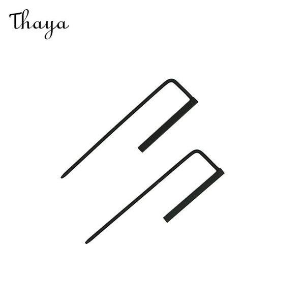 Thaya Minimalistische Ohrringe mit langem Schwanz